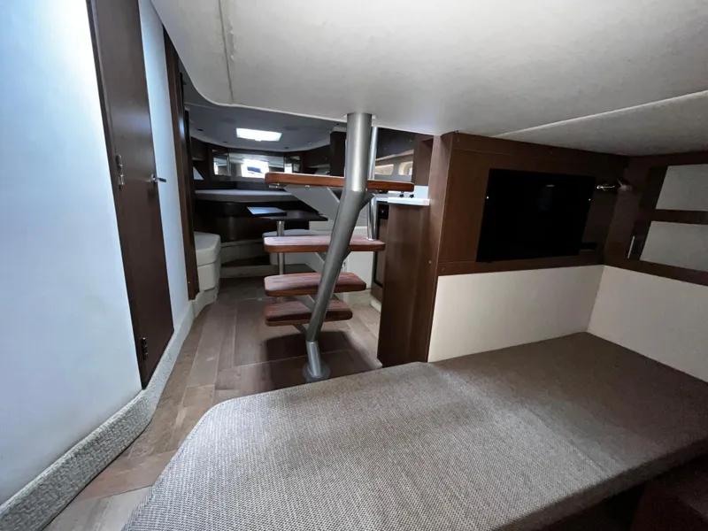 Slide: The Image of Interior of 2019 Sea Ray 350 Sundancer yacht, featuring modern design and comfortable seating. - 24