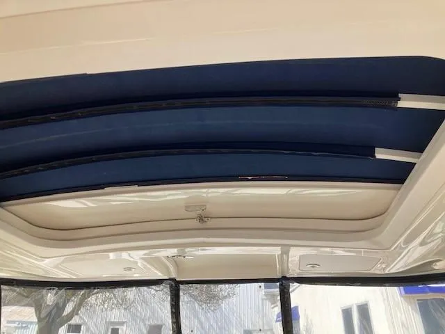 Slide: The Image of 2019 Sea Ray 350 Sundancer retractable roof detail. - 5
