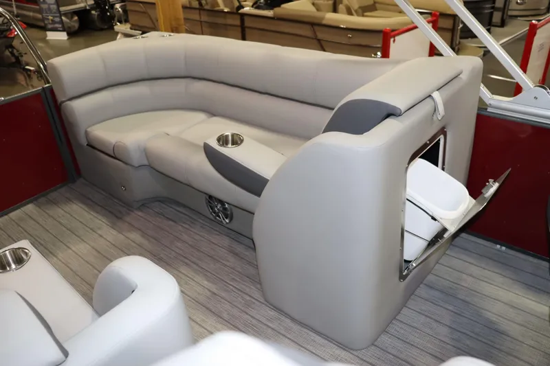 Slide: The Image of The image shows the interior of a 2022 Veranda VTX 22VLC boat with gray upholstered seating. - 10
