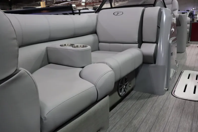 Slide: The Image of Gray upholstery in a modern boat with cup holders and sleek lines. - 4