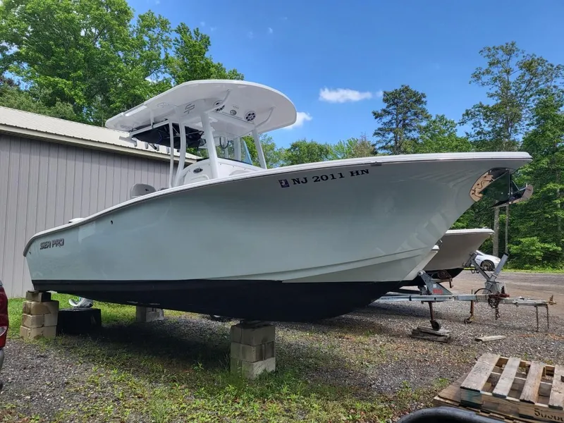 Slide: The Image of 2019 Sea Pro 239 Center Console boat elevated outdoors. - 1