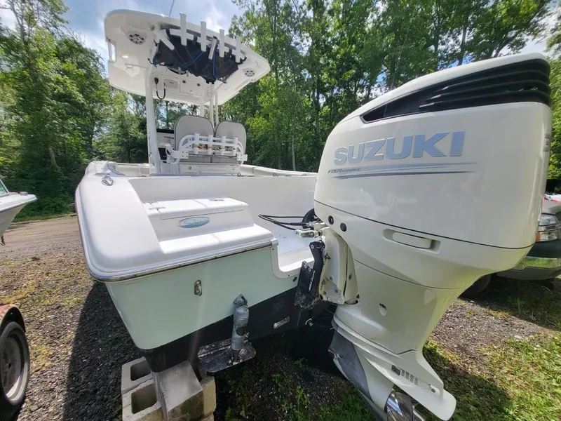 Slide: The Image of 2019 Sea Pro 239 Center Console with Suzuki engine outdoors. - 11
