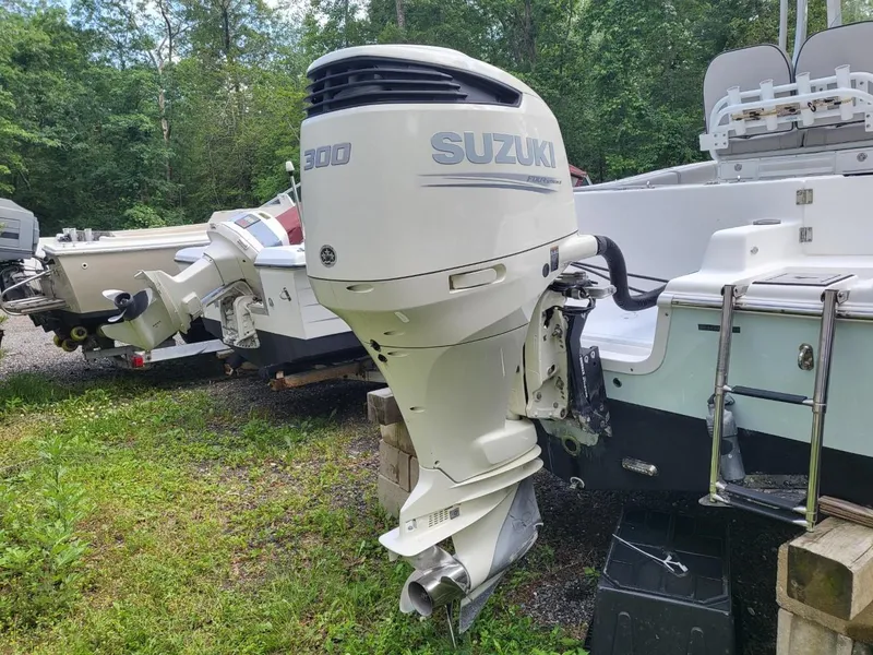 Slide: The Image of 2019 Sea Pro 239 Center Console with Suzuki 300 outboard motor. - 13
