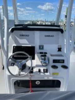 Slide: The Image of Helm of a 2019 Sea Pro 239 Center Console boat. - 16
