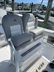 Slide: The Image of 2019 Sea Pro 239 Center Console boat seats at the dock. - 24