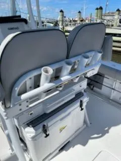 Slide: The Image of 2019 Sea Pro 239 Center Console with rod holders at the dock. - 25