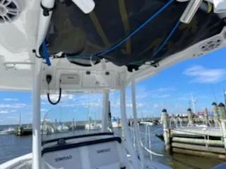 Slide: The Image of Interior view of a 2019 Sea Pro 239 Center Console boat at the dock. - 26