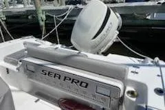 Slide: The Image of 2019 Sea Pro 239 Center Console boat with visible branding and equipment. - 31