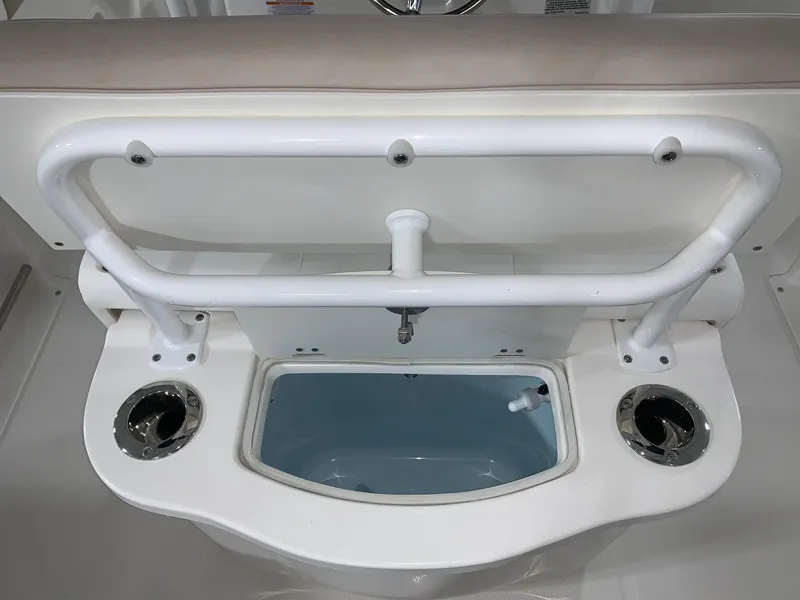 Slide: The Image of 2024 Robalo R222 Center Console livewell and rod holders. - 17