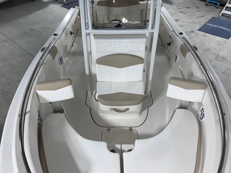 Slide: The Image of 2024 Robalo R222 Center Console boat interior with seating and console. - 5