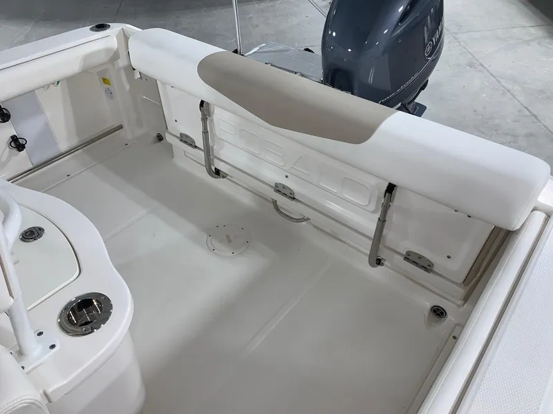 Slide: The Image of 2024 Robalo R222 Center Console boat interior with Yamaha outboard motor. - 8