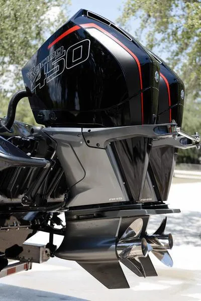 Slide: The Image of 2024 Velocity VR1 boat with dual outboard motors. - 7