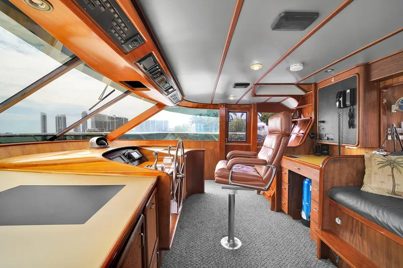 Slide: The Image of Luxurious interior of 1991 Jones-Goodell Yachtfish with leather seating and modern navigation equipment. - 16