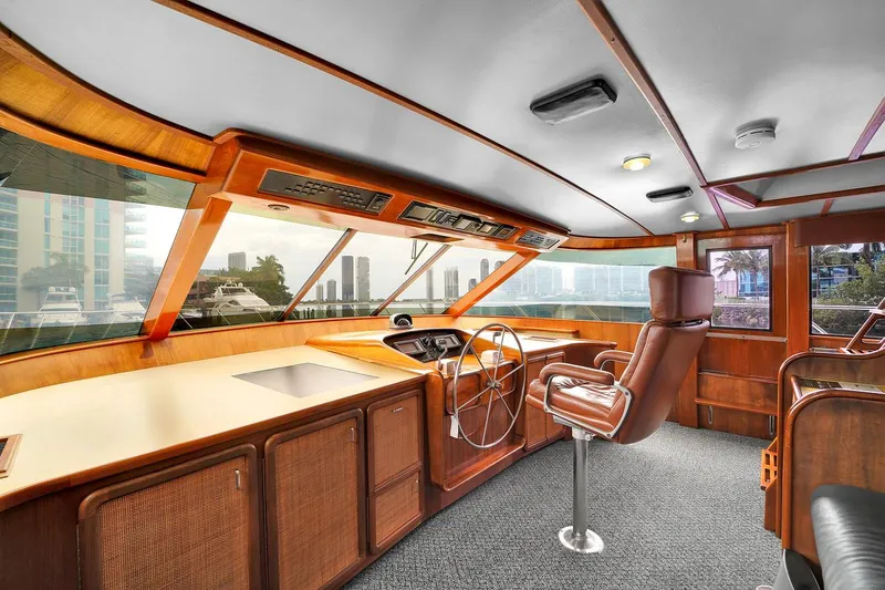 Slide: The Image of Interior of 1991 Jones-Goodell Yachtfish, featuring helm station and panoramic windows. - 3