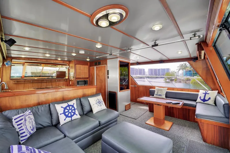 Slide: The Image of Luxurious interior of a 1991 Jones-Goodell Yachtfish with modern furnishings and nautical decor. - 31