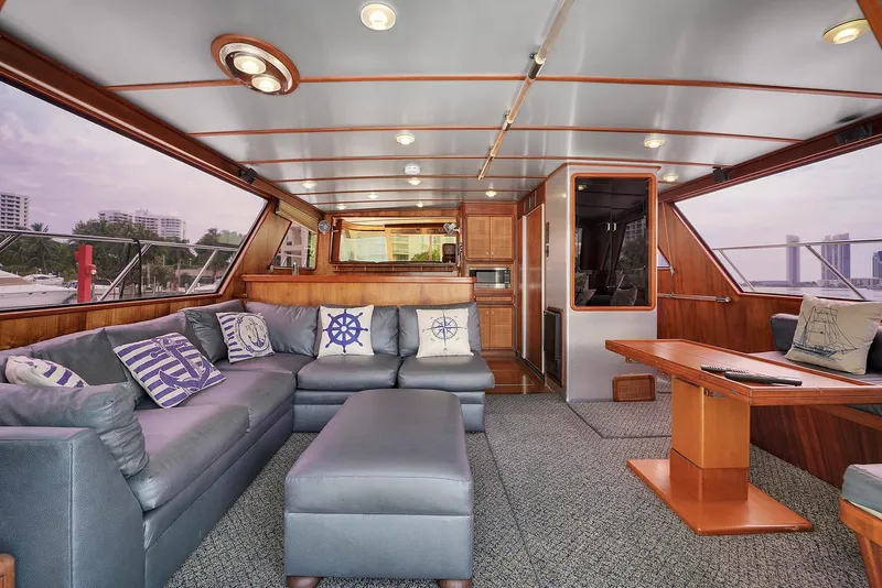 Slide: The Image of Luxurious interior of a 1991 Jones-Goodell Yachtfish with plush seating and nautical decor. - 33