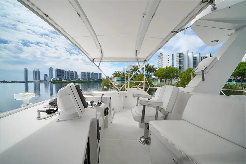 Slide: The Image of 1991 Jones-Goodell Yachtfish interior with modern seating and waterfront view. - 43
