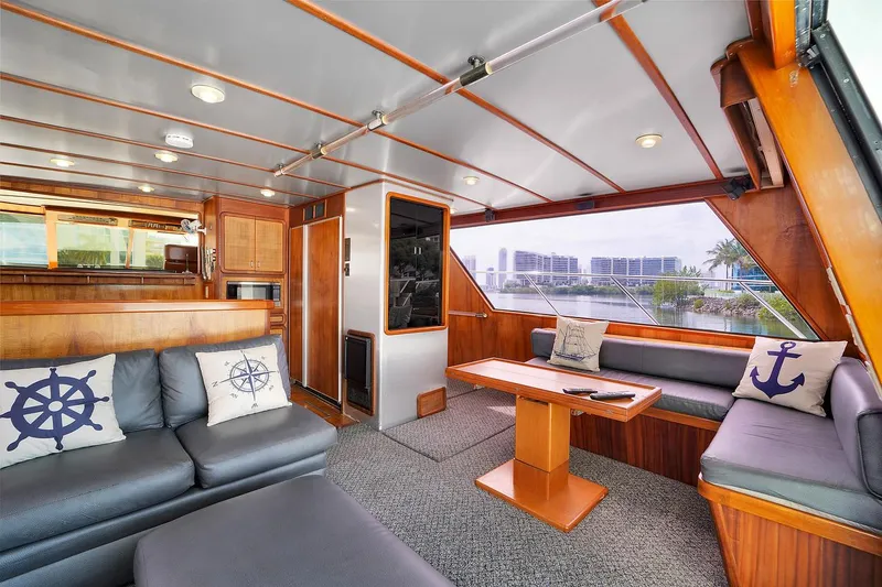 Slide: The Image of Luxurious interior of a 1991 Jones-Goodell Yachtfish with modern furnishings and waterfront view. - 48
