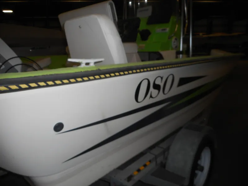 Slide: The Image of 1994 Hydra-Sports OSO Center Console boat on trailer in indoor storage. - 7