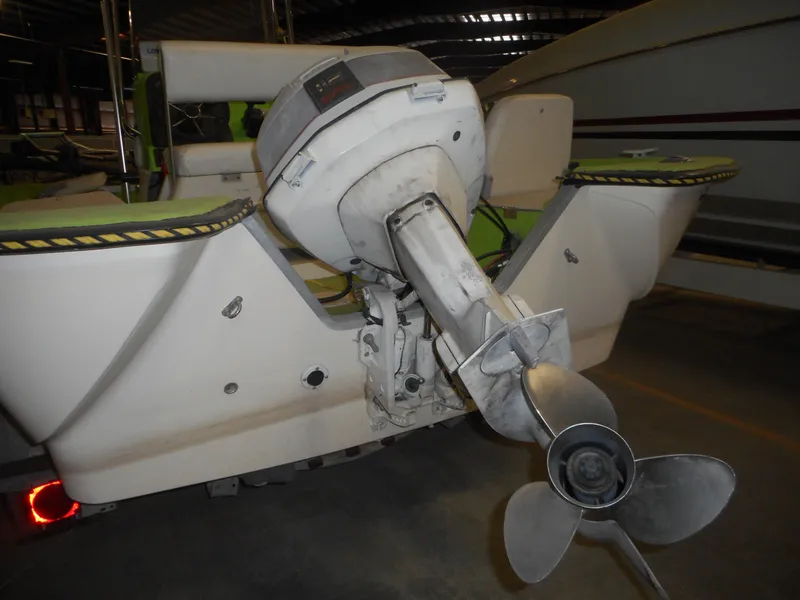 Slide: The Image of 1994 Hydra-Sports OSO Center Console boat with outboard motor in storage. - 8