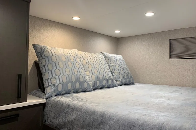 Slide: The Image of Cozy bedroom interior in 2019 Adonia Utopia Trip #12 RV with soft lighting. - 10