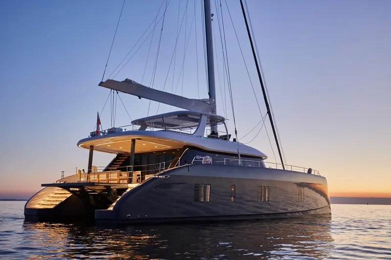 Slide: The Image of Luxurious 2025 Sunreef 80 yacht at sunset, showcasing elegant design and spacious deck. - 40