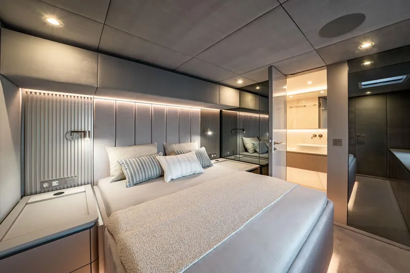 Slide: The Image of Luxurious Sunreef 80 yacht bedroom interior, 2025 model, featuring modern design and ambient lighting. - 42