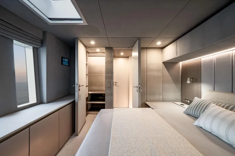 Slide: The Image of Luxurious interior of 2025 Sunreef 80 yacht, featuring modern bedroom design and ambient lighting. - 43
