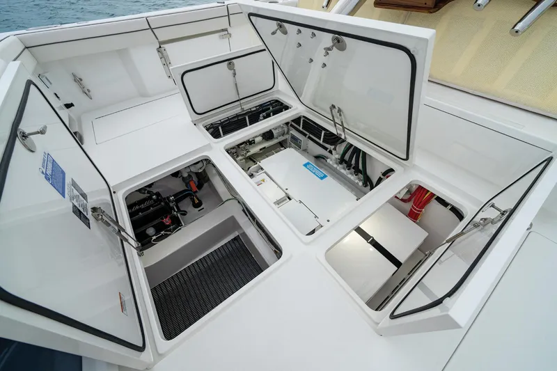 Slide: The Image of 2025 Valhalla Boatworks V-55 open storage compartments on deck. - 7