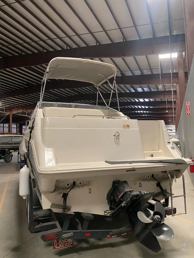 Slide: The Image of 1995 Bayliner Ciera boat in indoor storage facility. - 19
