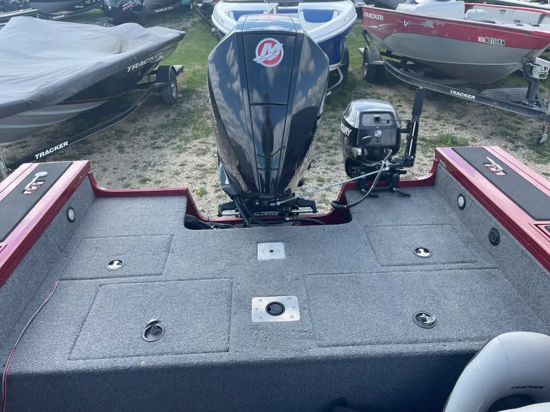 Slide: The Image of 2019 Tracker Targa 18 WT boat interior with two gray seats. - 11