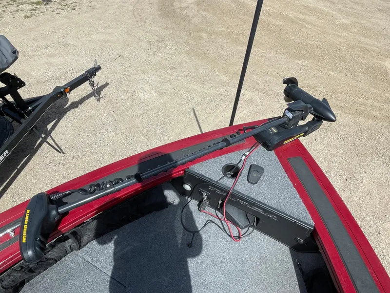 Slide: The Image of 2019 Tracker Targa 18 WT boat interior with Mercury outboard motor in garage. - 12