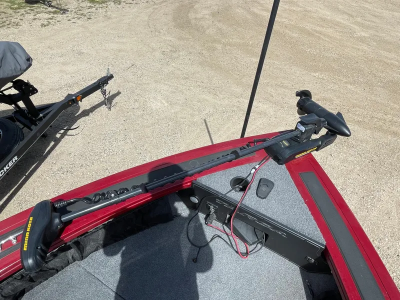 Slide: The Image of 2019 Tracker Targa 18 WT boat storage compartments with open lids, showcasing interior design. - 13