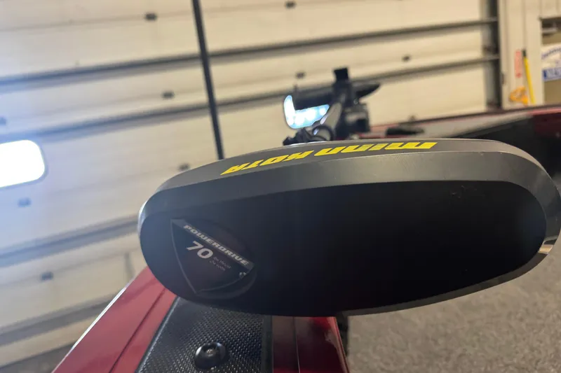 Slide: The Image of Minn Kota PowerDrive motor on 2019 Tracker Targa 18 WT boat in garage setting. - 17