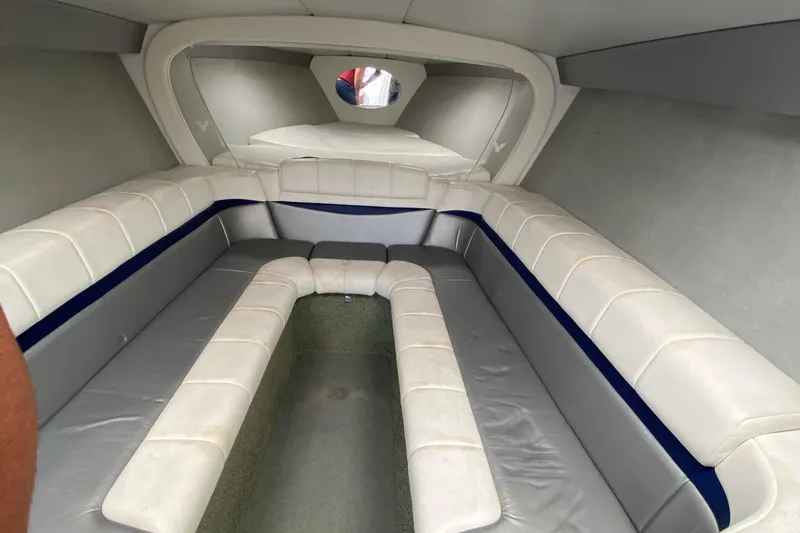 Slide: The Image of Interior of 2013 Formula 382 FASTech boat with white and gray seating. - 13