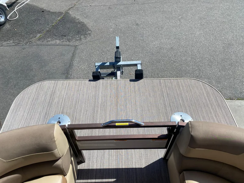 Slide: The Image of 2019 Veranda VF25F2 boat deck with textured flooring and metal fixtures. - 10