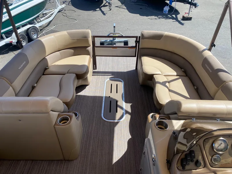 Slide: The Image of Luxurious seating on 2019 Veranda VF25F2 pontoon boat with cup holders and stylish design. - 13