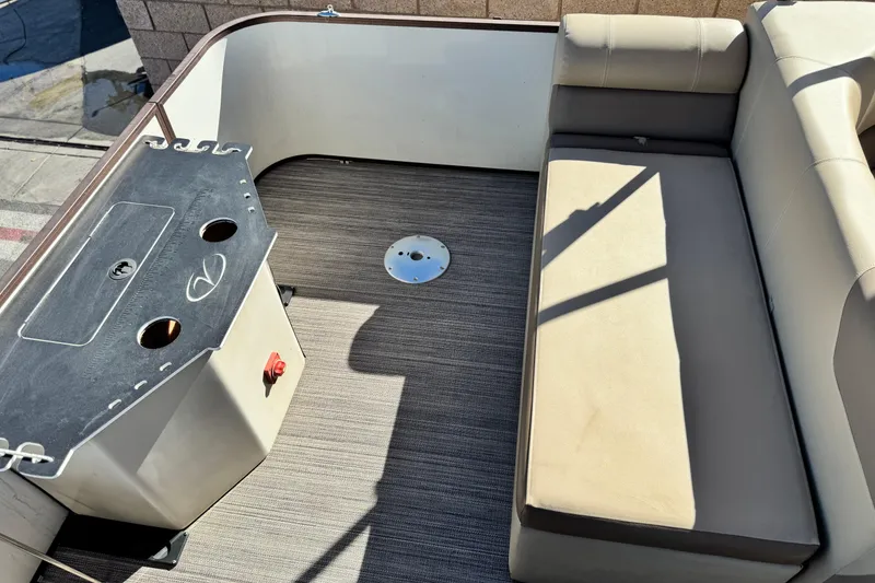 Slide: The Image of 2019 Veranda VF25F2 boat interior with seating and storage area. - 20