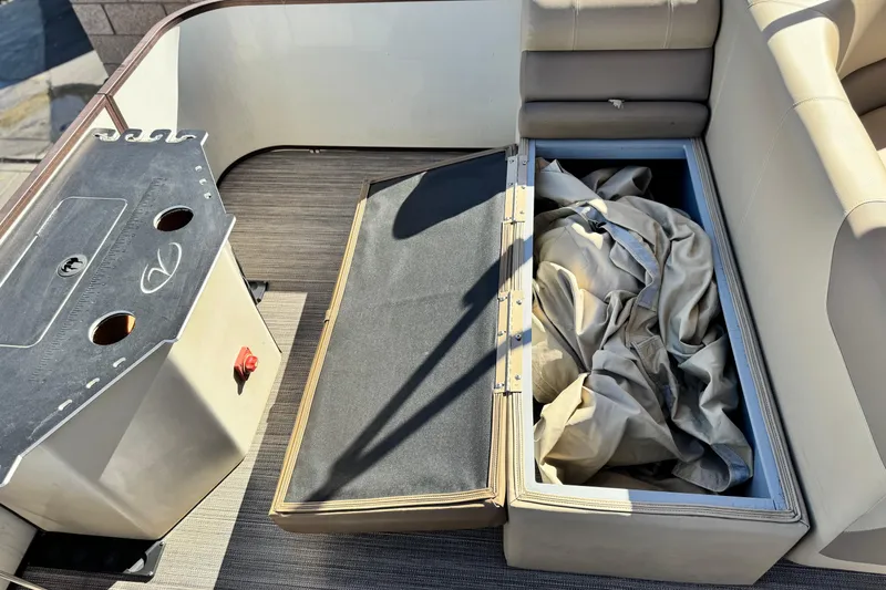 Slide: The Image of 2019 Veranda VF25F2 boat interior with storage compartment and seating. - 21