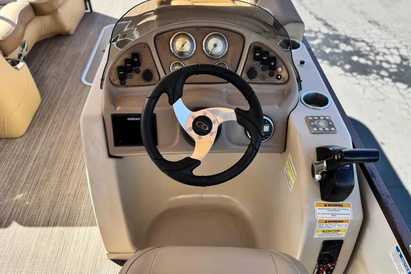 Slide: The Image of 2019 Veranda VF25F2 boat dashboard with steering wheel and control panel. - 26