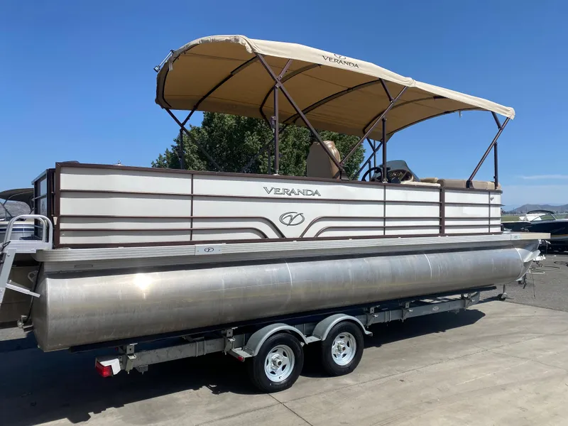 Slide: The Image of 2019 Veranda VF25F2 with Yamaha VMAX outboard motor, parked outdoors. - 7