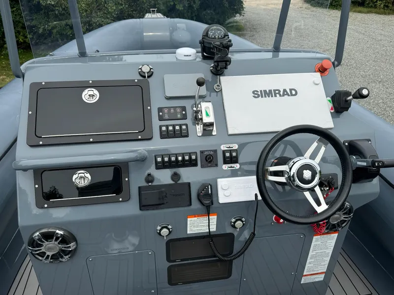 Slide: The Image of Control panel of a 2019 Sealegs 9M boat with Simrad navigation system. - 13