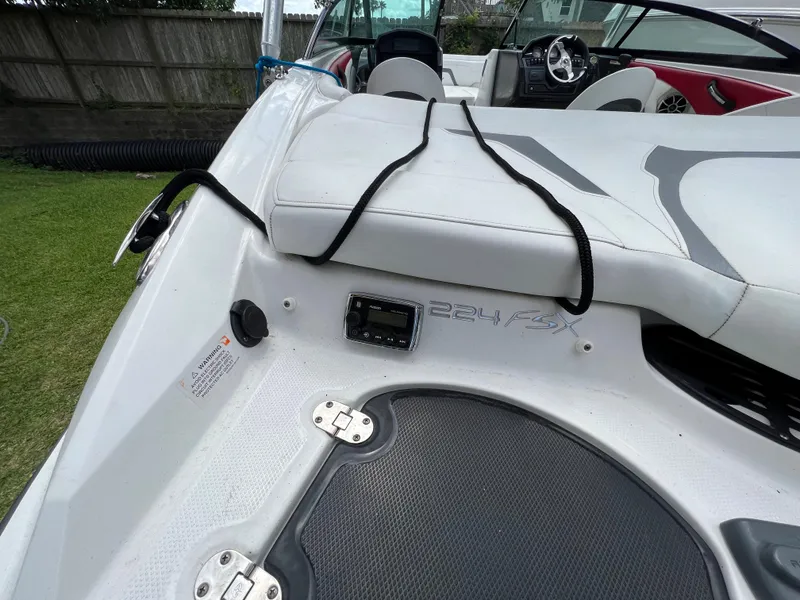 Slide: The Image of 2015 Monterey 224FSX boat interior with seating and control panel. - 29