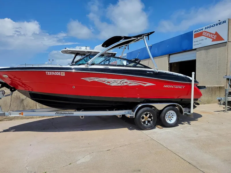 Slide: The Image of 2015 Monterey 224FSX boat on trailer at Ron Hoover service center. - 38