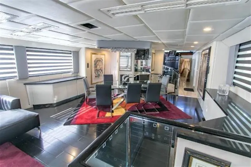 Slide: The Image of Luxurious interior of 1990 Broward Raised Pilothouse MY yacht with modern furnishings. - 19