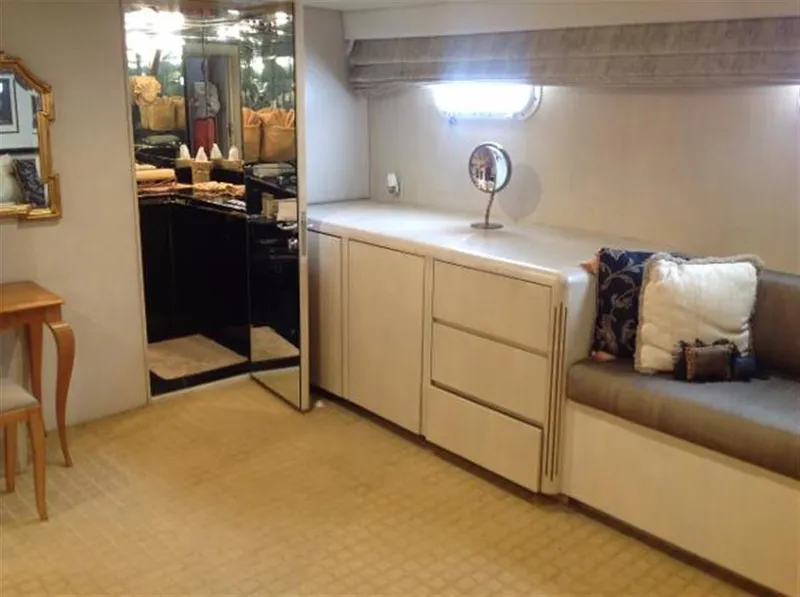 Slide: The Image of Luxurious interior of 1990 Broward Raised Pilothouse MY yacht with elegant furnishings. - 24