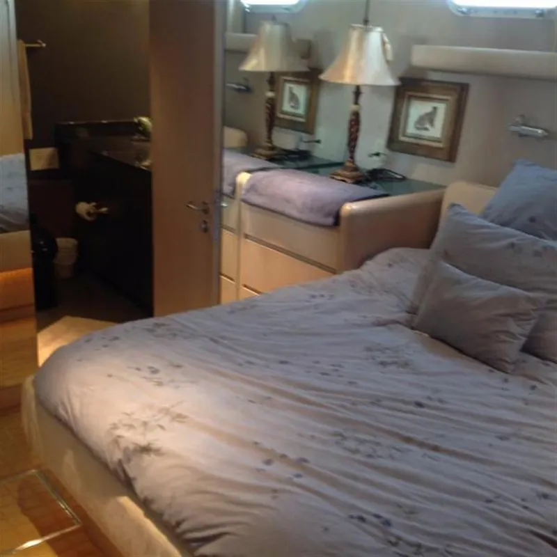 Slide: The Image of Luxurious bedroom interior on 1990 Broward Raised Pilothouse MY yacht. - 25
