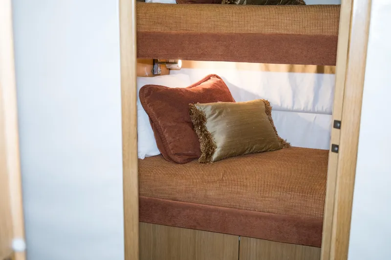 Slide: The Image of Cozy bunk bed in 1997 Hatteras 65 Convertible yacht cabin. - 25