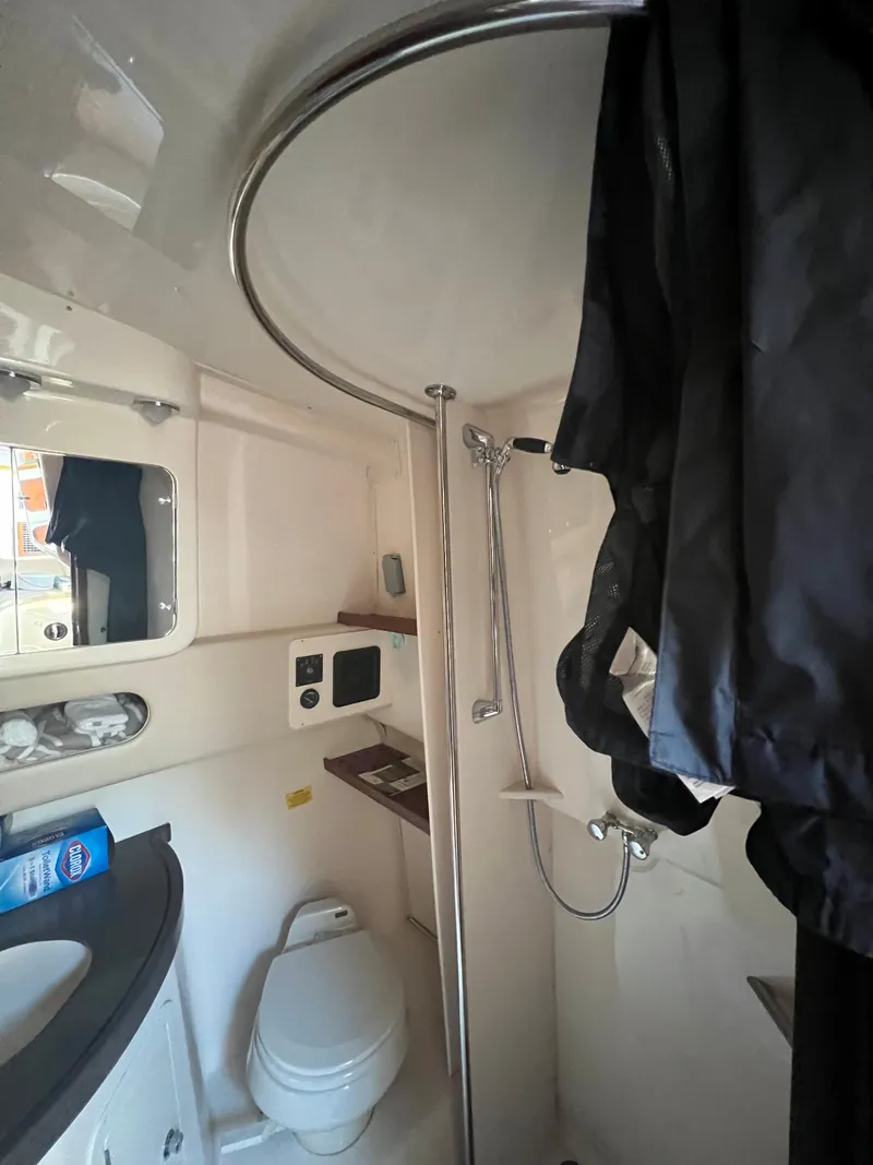 Slide: The Image of 2006 Grady-White 360 Express boat bathroom with shower and toilet. - 16