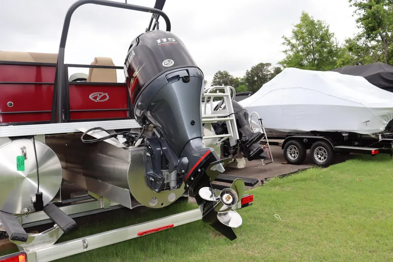Slide: The Image of 2022 Veranda VR20 RC pontoon boat with outboard motor on grass. - 12